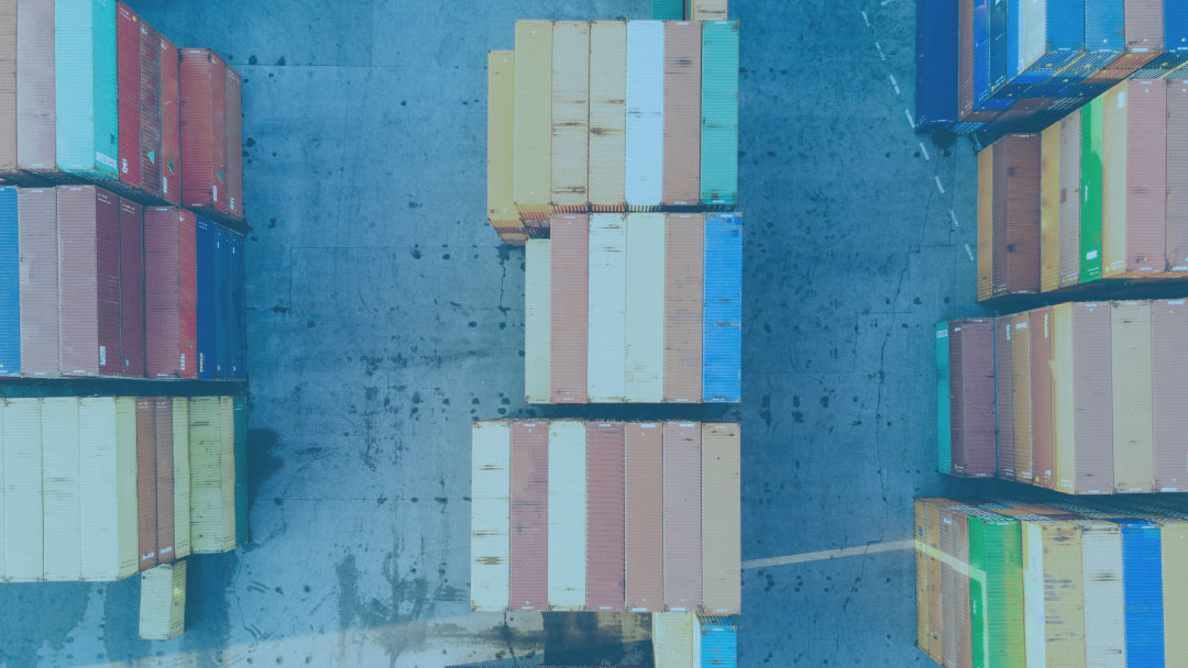 Birds eye view shipping containers stacked