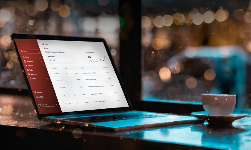 Jobs Dashboard on laptop in a coffee shop window table
